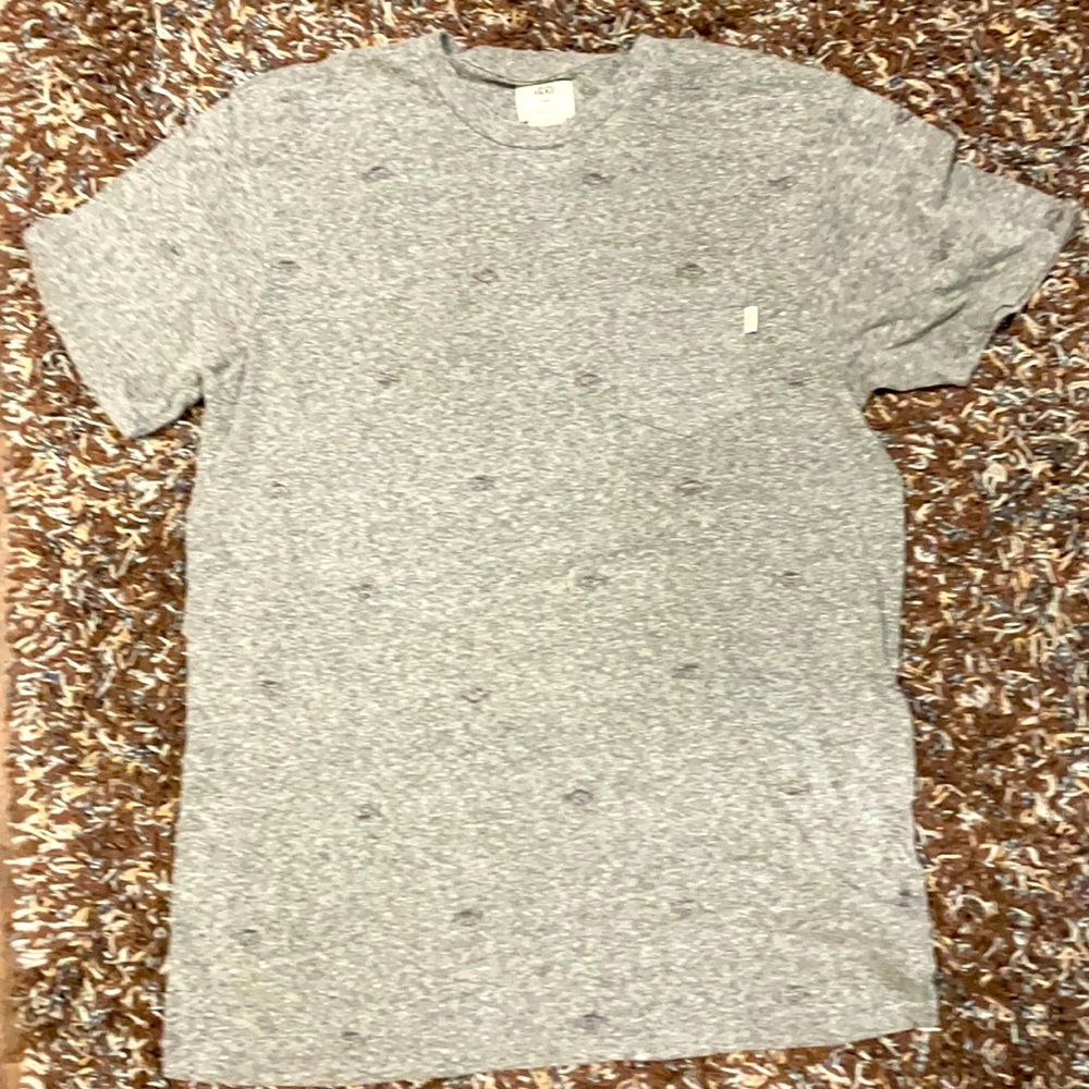 Gray vans shirt  this this is a really food shirt I’ve took care of itNo stains